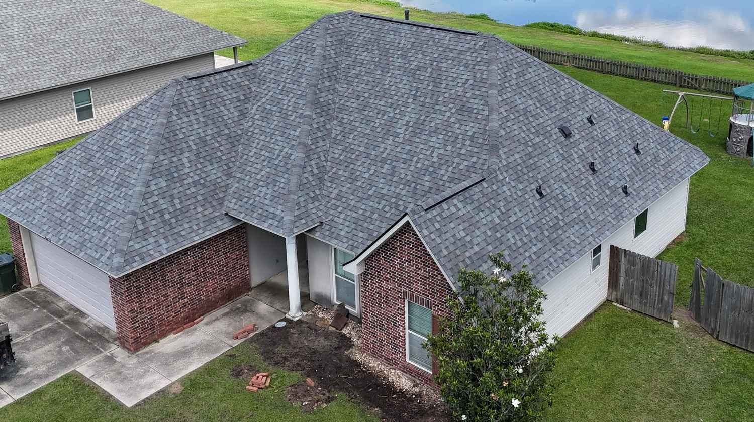 Aerial drone roof inspection of a brick home in Louisiana